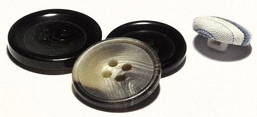 File:Plastic & fabric buttons showing holes & shank.jpg